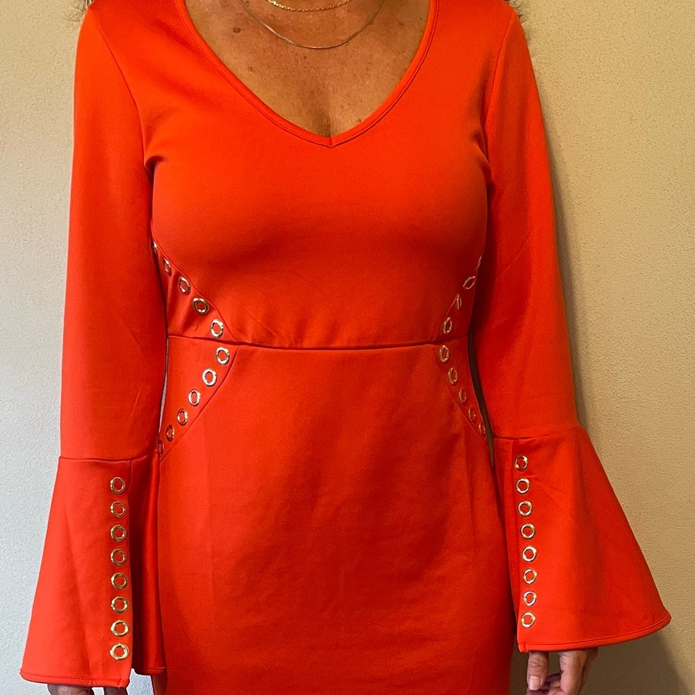 Venus Bodycon grommet trim v-neck dress, Medium.